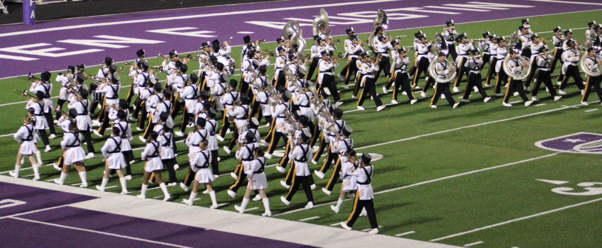 The Dragon Band performing a diagonal maneuver during the UIL Region 21 Marching contest on October 14th.