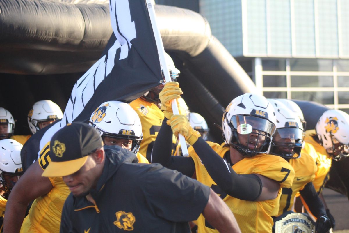 Dragons preparing to take the field before the game against Lufkin on Friday.