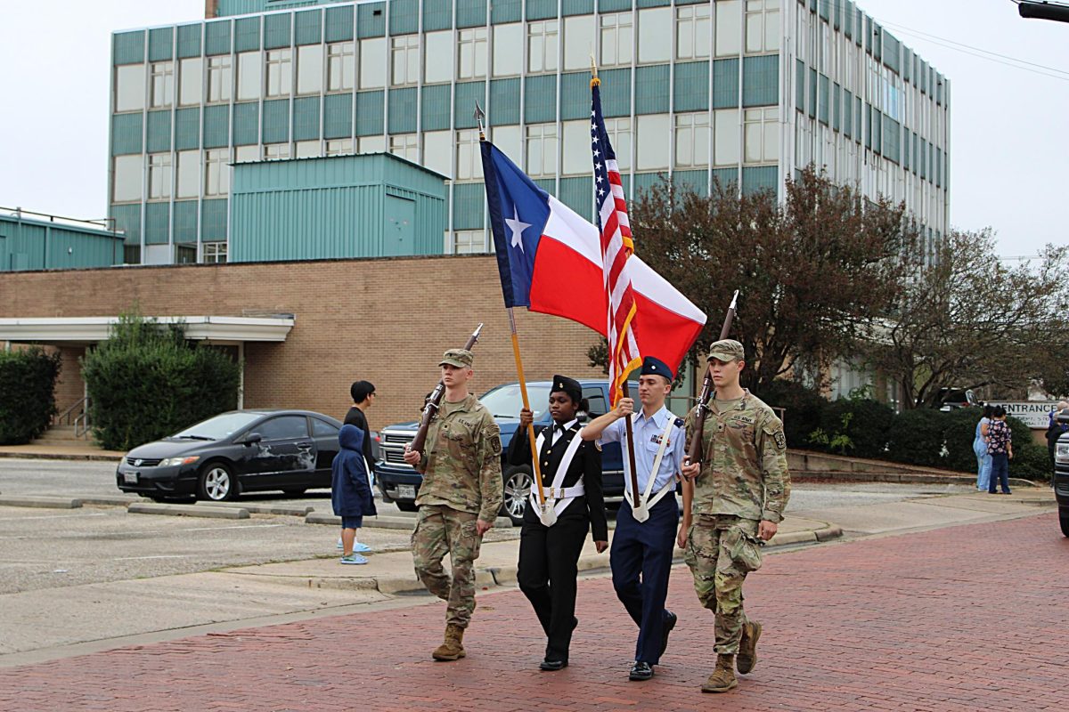 JROTC students kick off the Veteran's Day parade last Saturday.