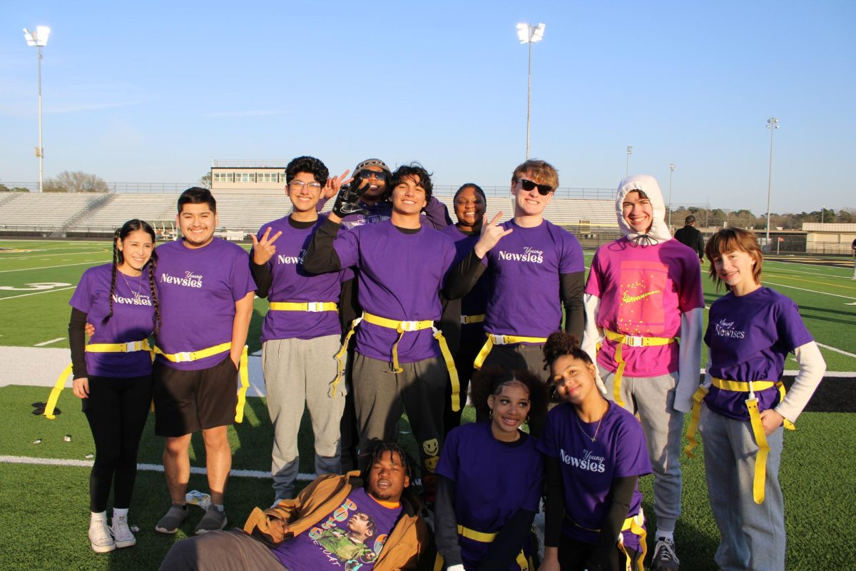 FROM EDITING THE PAPER TO EXECUTING PLAYS The Dragon Echo team poses just before kickoff at the Class of 2028's Powder Puff Football Tournament Fundraiser.