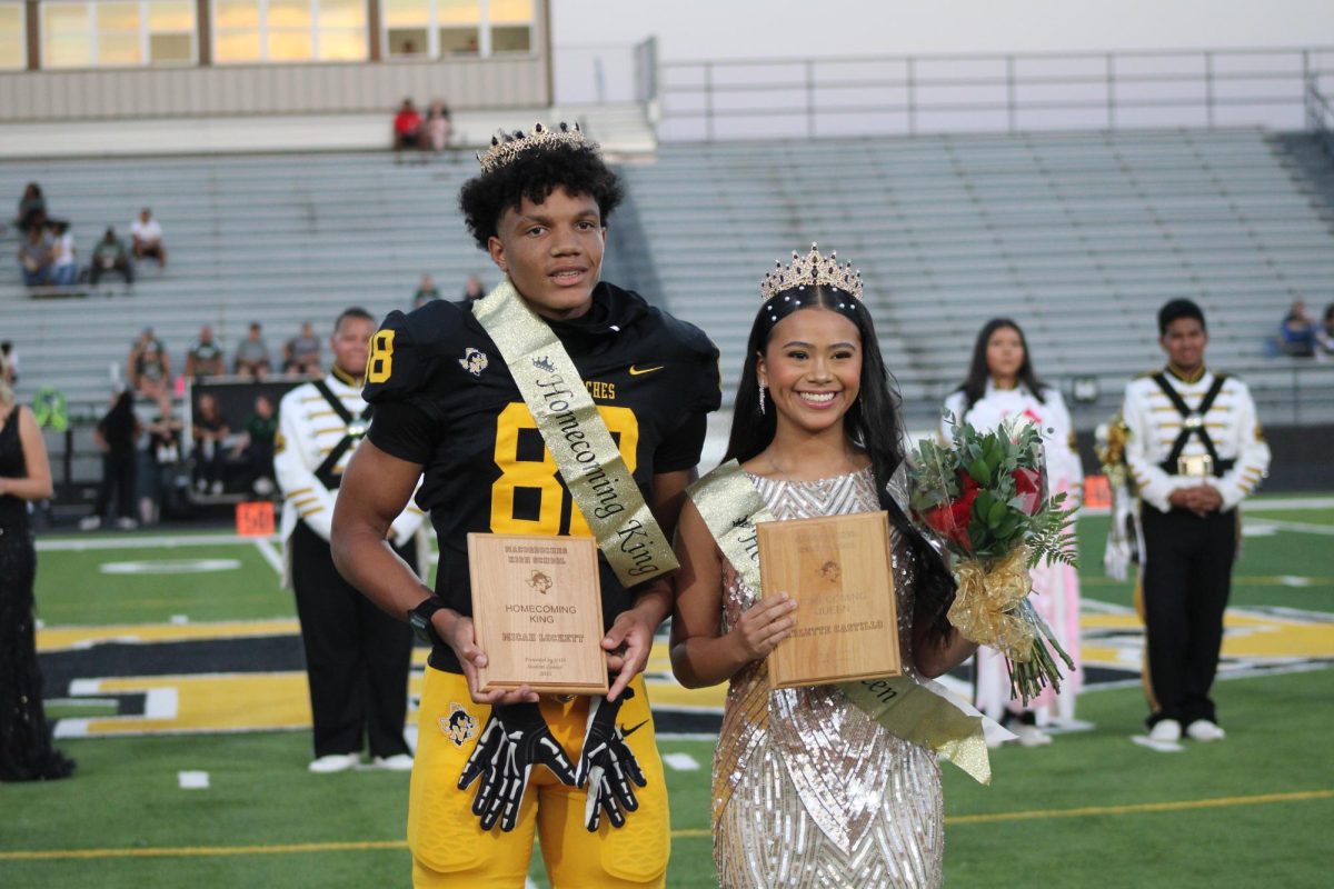 Dragon Royalty - Homecoming King Micah Lockett and Queen Arlette Castillo crowned during Friday night's pre-game ceremony.